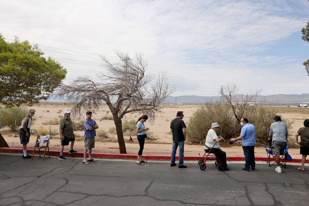 People line up for lottery tickets at the Primm Valley Lotto Store on the Nevada-California bor ...
