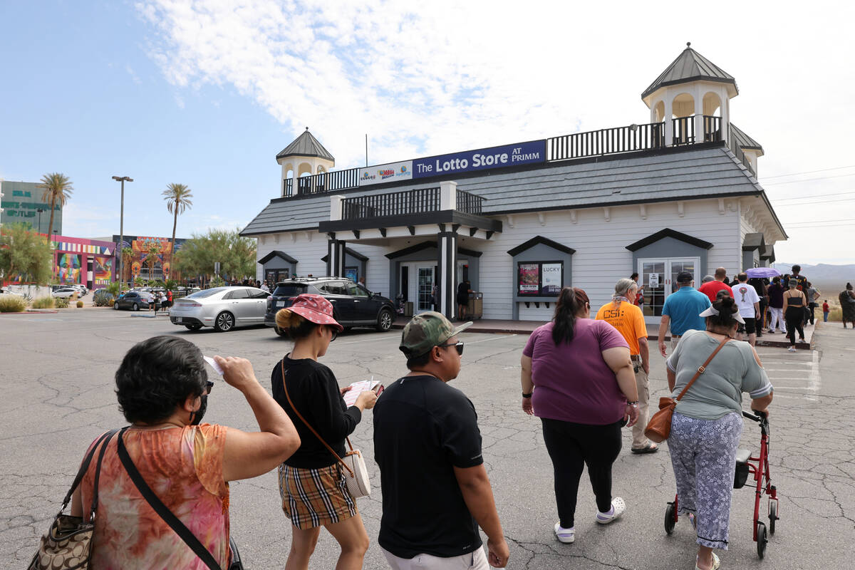 People line up for lottery tickets at the Primm Valley Lotto Store on the Nevada-California bor ...