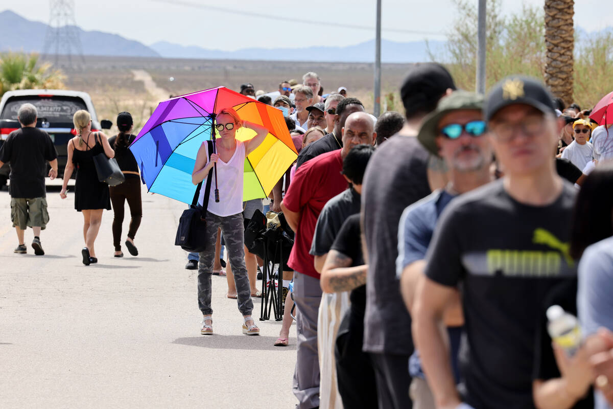People line up for lottery tickets at the Primm Valley Lotto Store on the Nevada-California bor ...