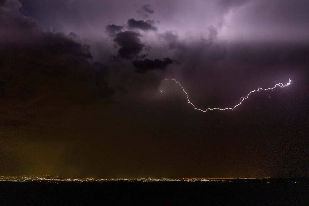 Lightning strikes across the skyline on Thursday, July 28, 2022, in Las Vegas. (L.E. Baskow/Las ...