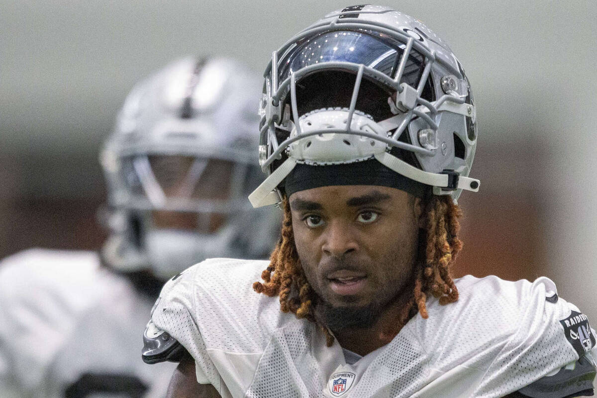 This Sept. 9, 2021, file photo, shows then-Raiders cornerback Damon Arnette (20) during team pr ...