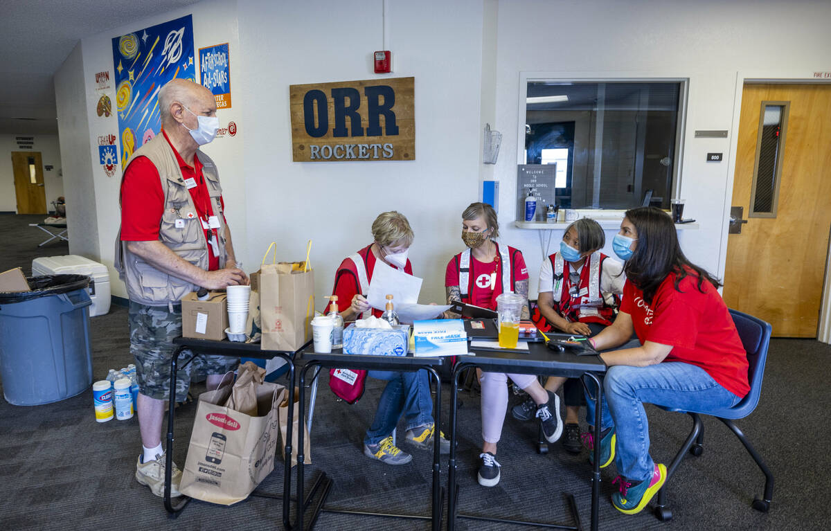 A crew from the Red Cross set up a shelter at William E. Orr Middle School for those displaced ...