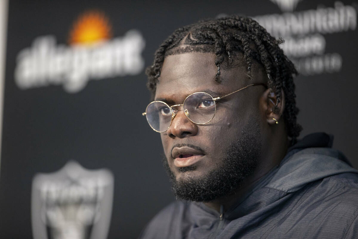 Raiders offensive lineman Alex Leatherwood attends a news conference after the team’s tr ...