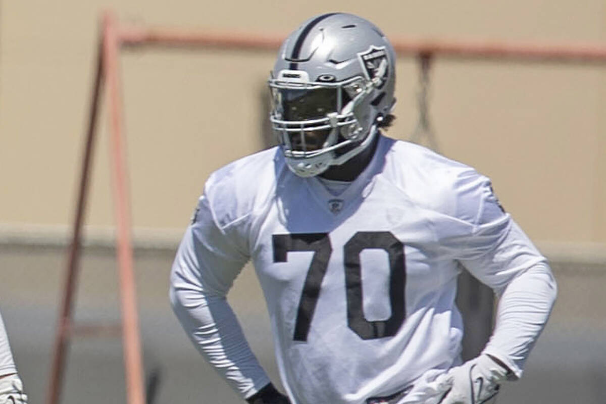Raiders offensive tackle Alex Leatherwood (70) runs during a team practice on Thursday, June 2, ...