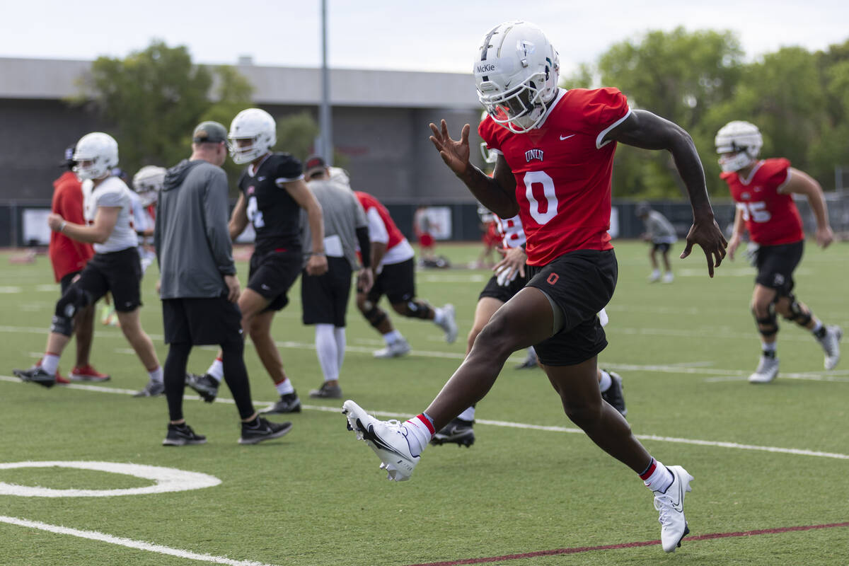 UNLV's Senika McKie (0) warms up during a team football practice at UNLV in Las Vegas, Saturday ...