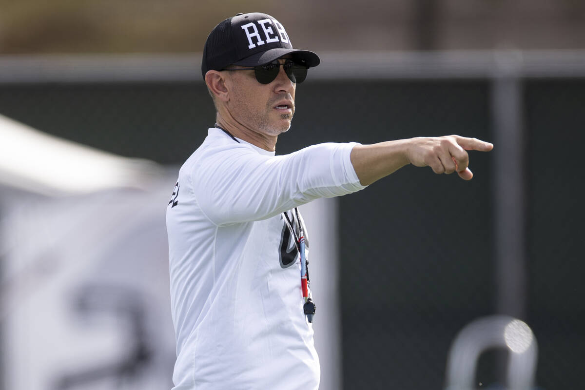 UNLV's football head coach Marcus Arroyo calls on his players players during a team practice at ...
