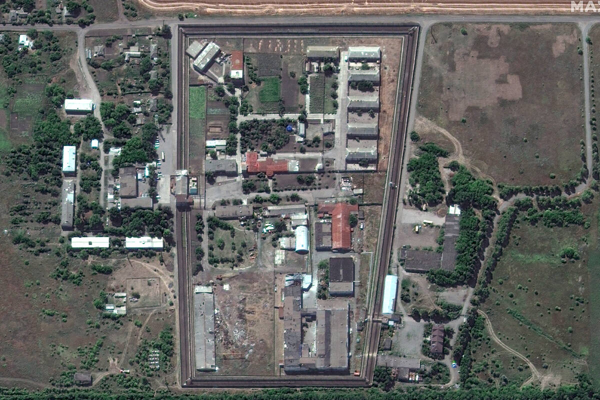 In this satellite photo provided by Maxar Technologies, a view of the Olenivka detention center ...