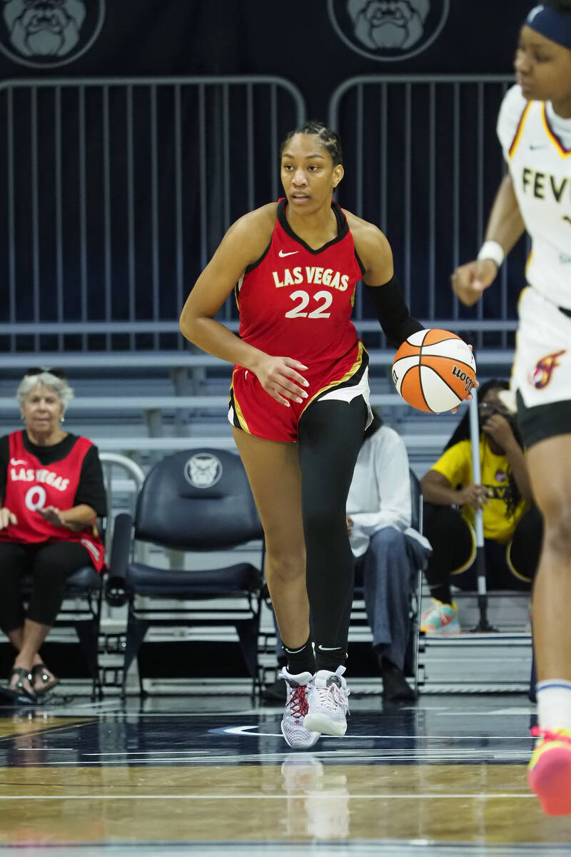 A'ja Wilson #22 of the Las Vegas Aces handles the ball during the game against the Indiana Feve ...