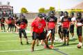 High school football teams face heat as practice begins