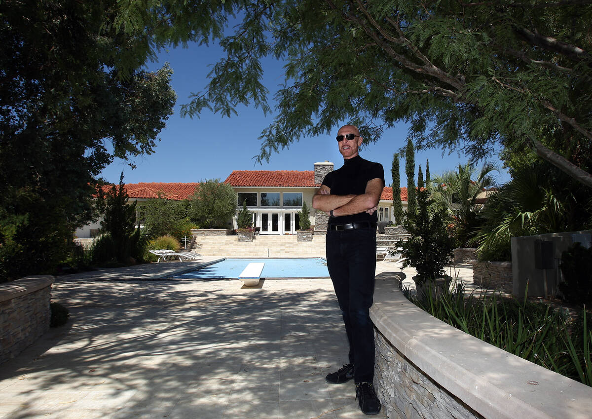 Late author Terry Goodkind stands in front of his pool at his Boulder City estate. (Review-Jour ...