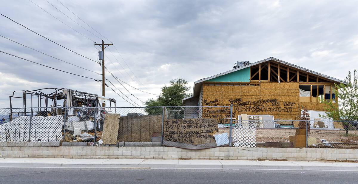 A property in disrepair with exterior signage off of North Chamberlain Lane within the Windsor ...