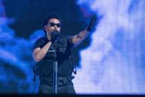 The Weeknd performs at the Coachella Music & Arts Festival at the Empire Polo Club on Sunda ...