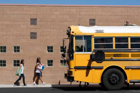 RJ FILE*** JOHN LOCHER/LAS VEGAS REVIEW-JOURNAL A school bus idles in the parking lot of the Ma ...