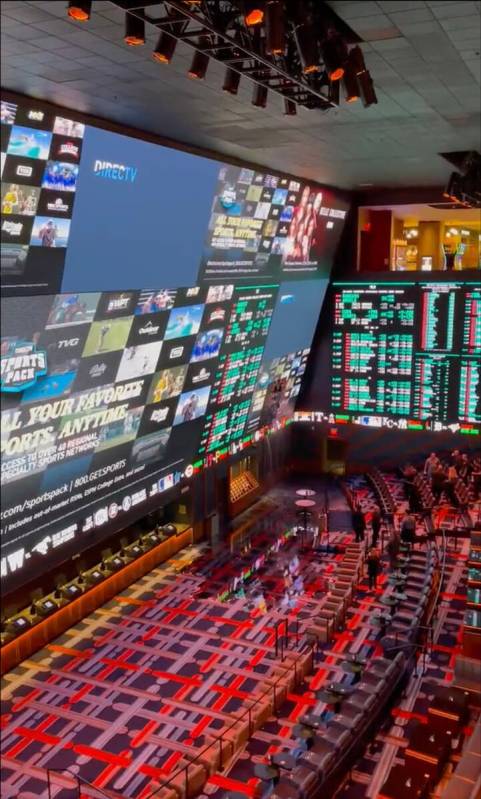 Water pours through the screen of the Circa sportsbook Thursday during a rainstorm. Screen shot ...