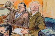 FILE - This artist sketch depicts Guy Wesley Reffitt, joined by his lawyer William Welch, right ...