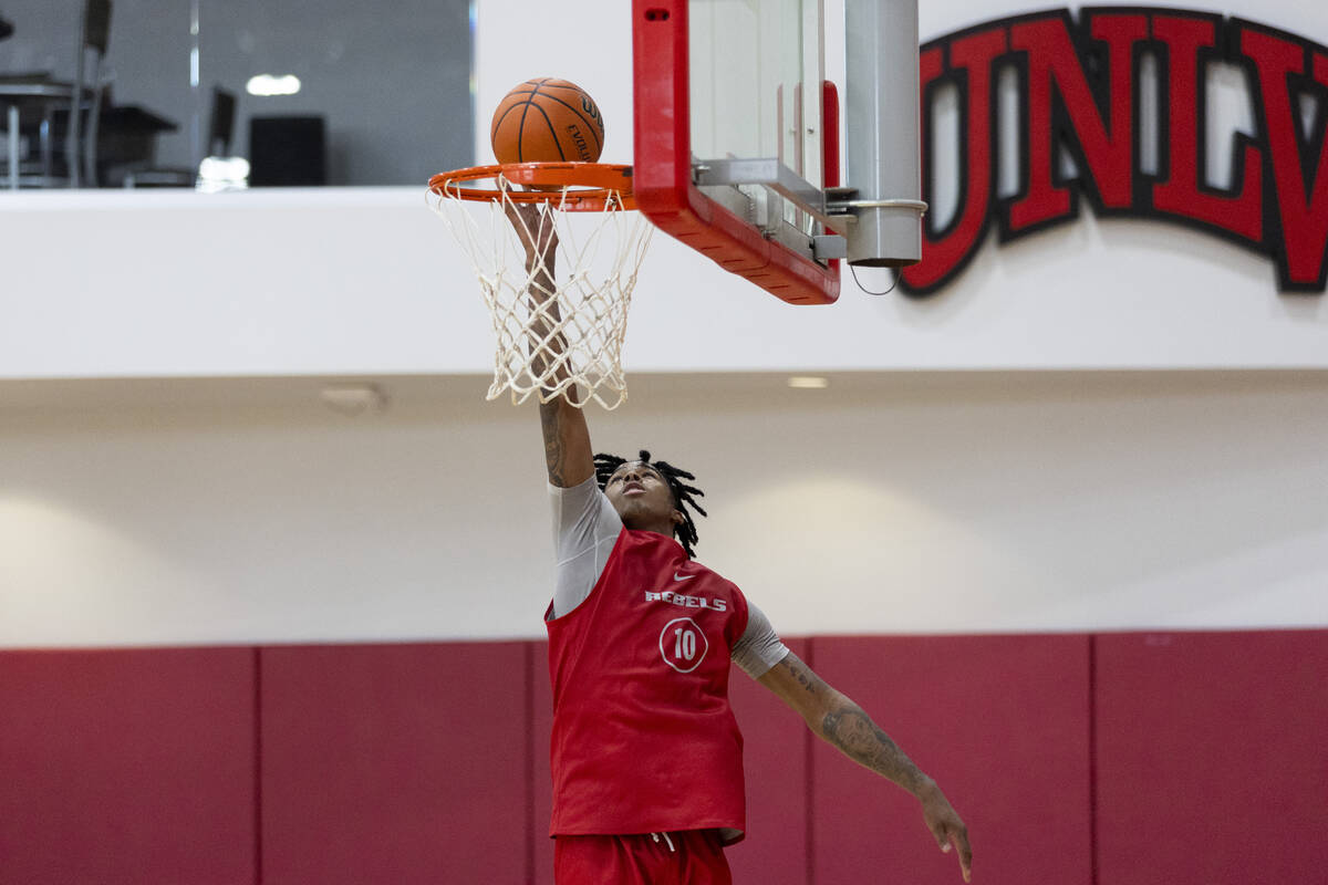 UNLV's Keshon Gilbert (10) takes a shot at the basket during a team basketball practice at Mend ...