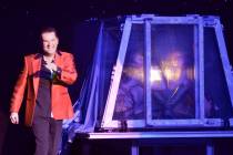 Magician Dirk Arthur, left, performs with dancers Destiny Johnson, center, and Lauren Metter in ...