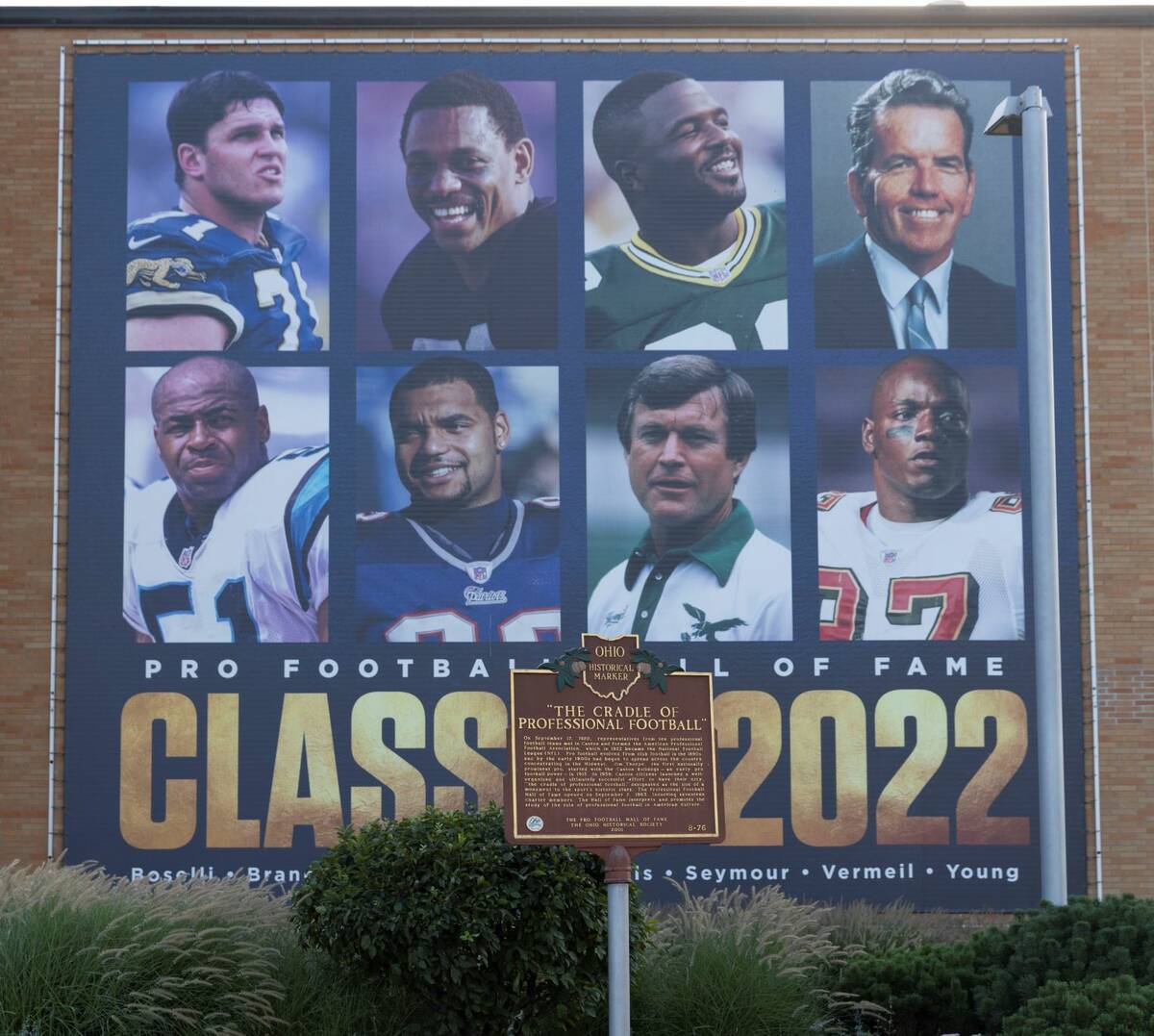 A banner with 2022 Pro Football Hall of Fame enshrinees: from top left, Tony Borselli, Raiders ...