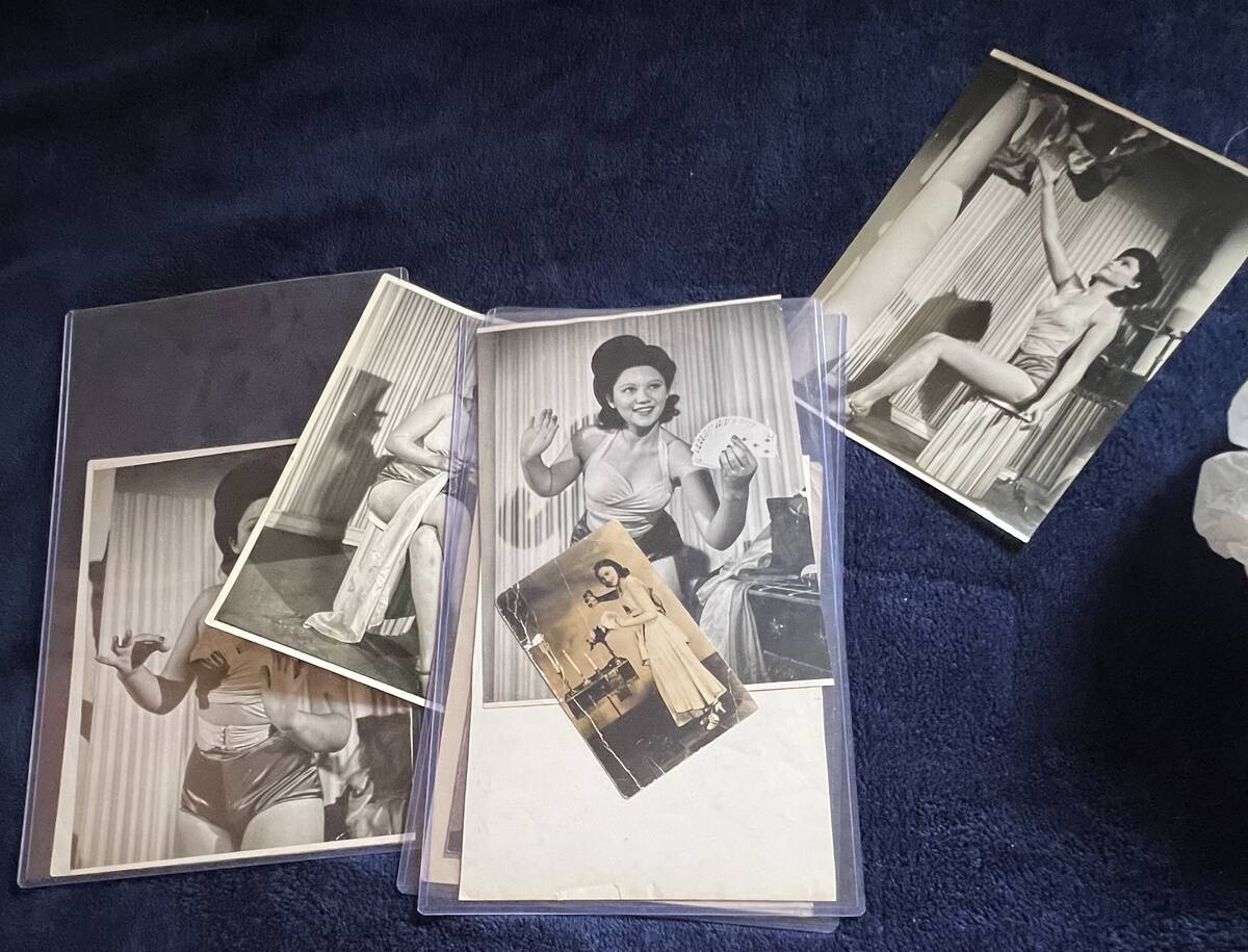 Scrapbook photos of Gloria Dea are shown at her Las Vegas home on Aug. 9, 2022. Dea was the fir ...