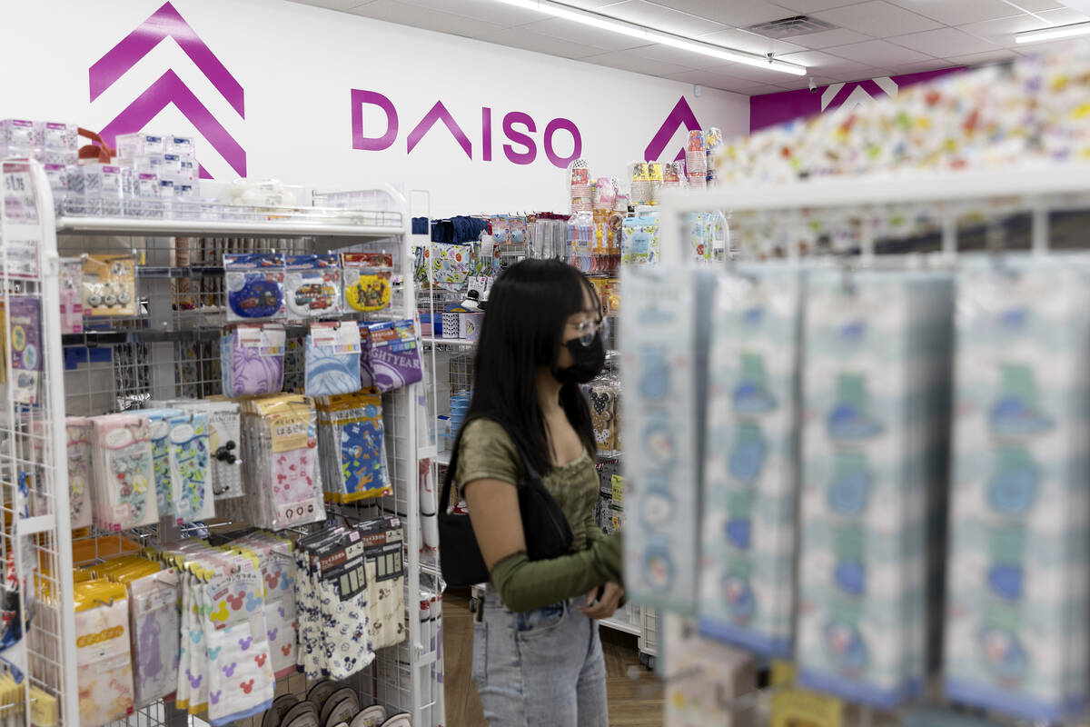 A customer shops at Japanese discount store Daiso in Arroyo Market Square on Thursday, Aug. 4, ...