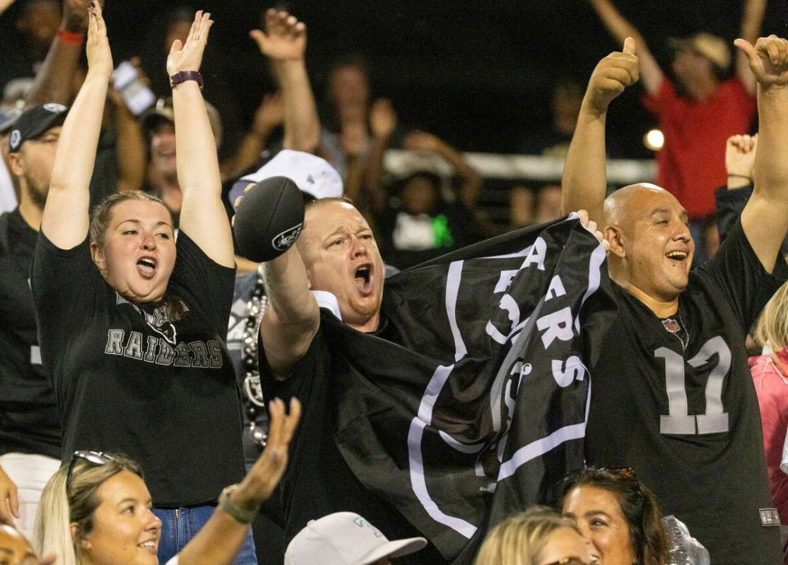 Raiders fans cheer during the first half of the NFL Hall of Fame game against the Jacksonville ...