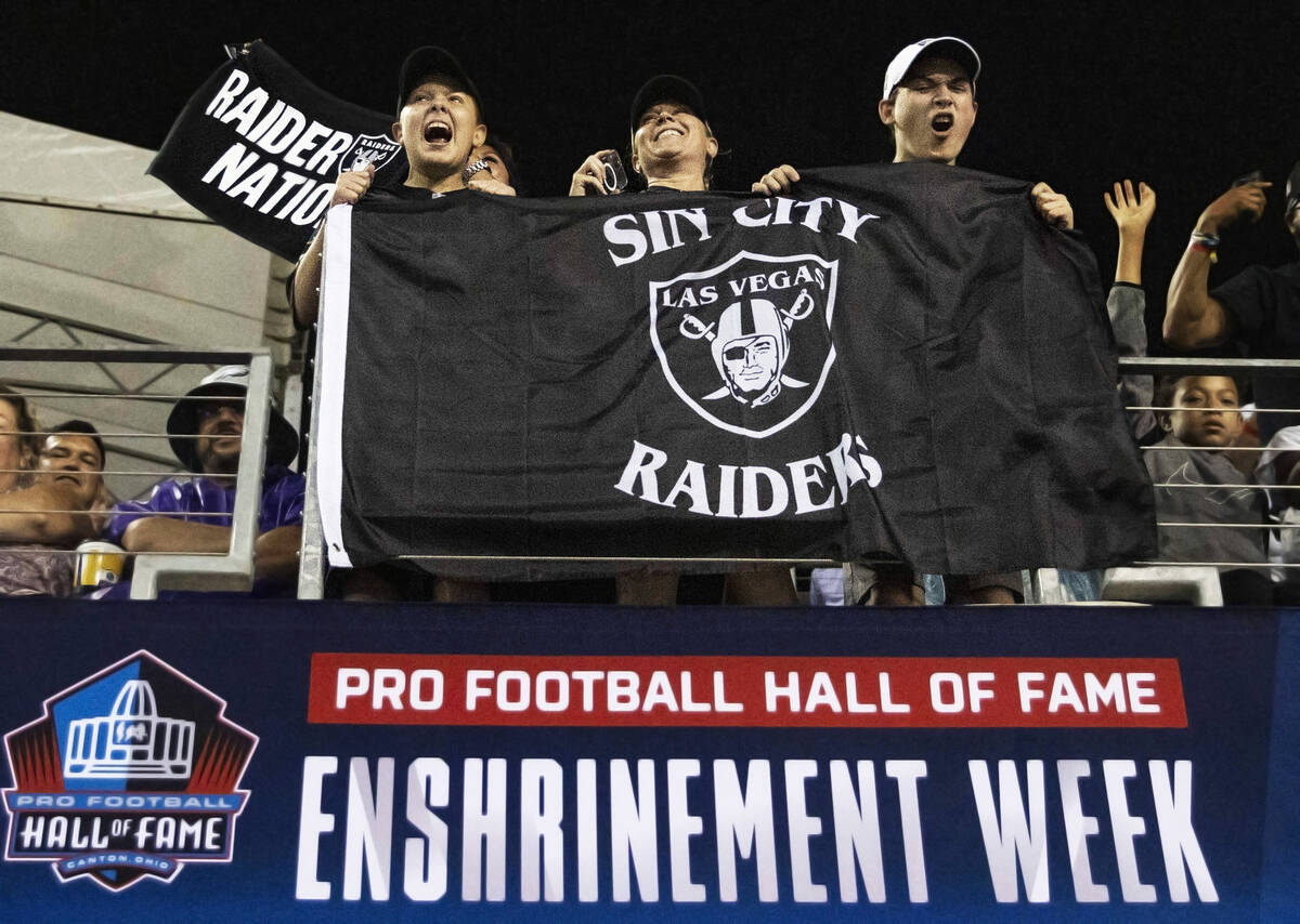 Raiders fans cheer during the first half of the NFL Hall of Fame game against the Jacksonville ...