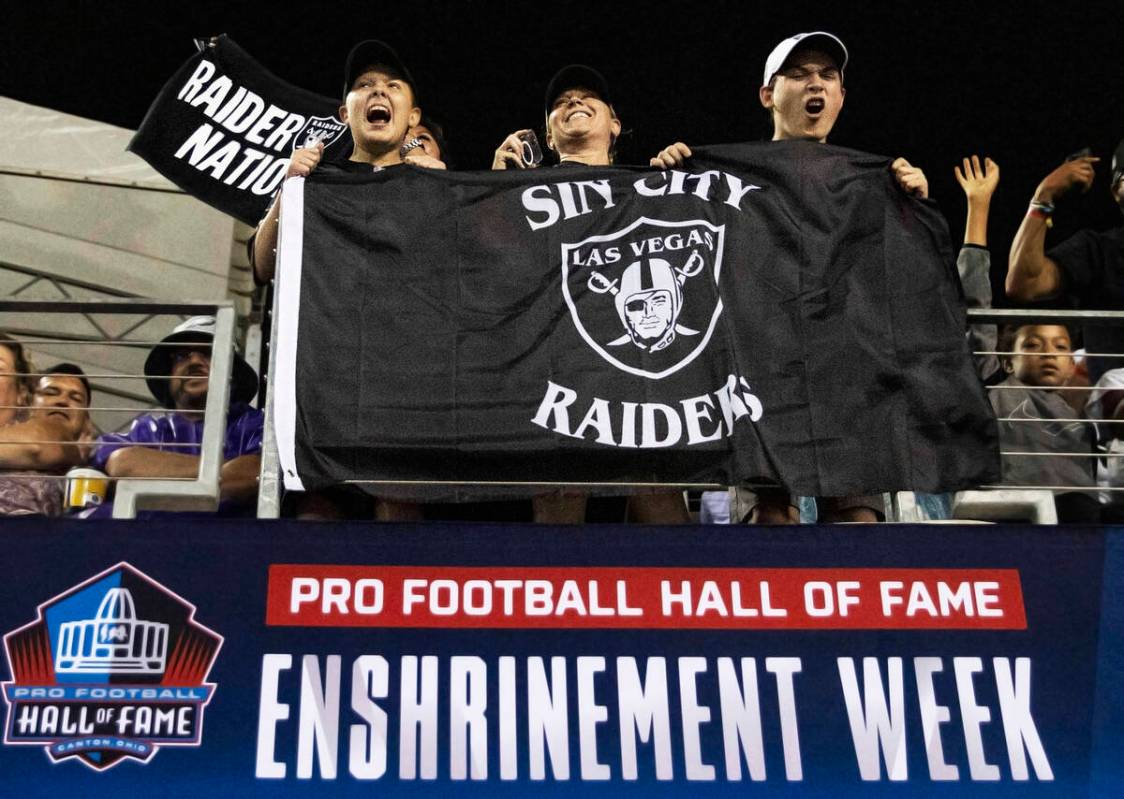 Raiders fans cheer during the first half of the NFL Hall of Fame game against the Jacksonville ...