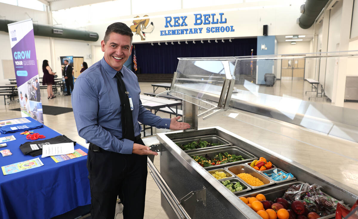 Clark County School District dietitian Jake Yarberry shows an example of the salad bar that wil ...