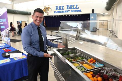 Clark County School District dietitian Jake Yarberry shows an example of the salad bar that wil ...