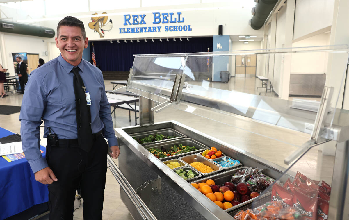 Clark County School District dietitian Jake Yarberry shows an example of the salad bar that wil ...