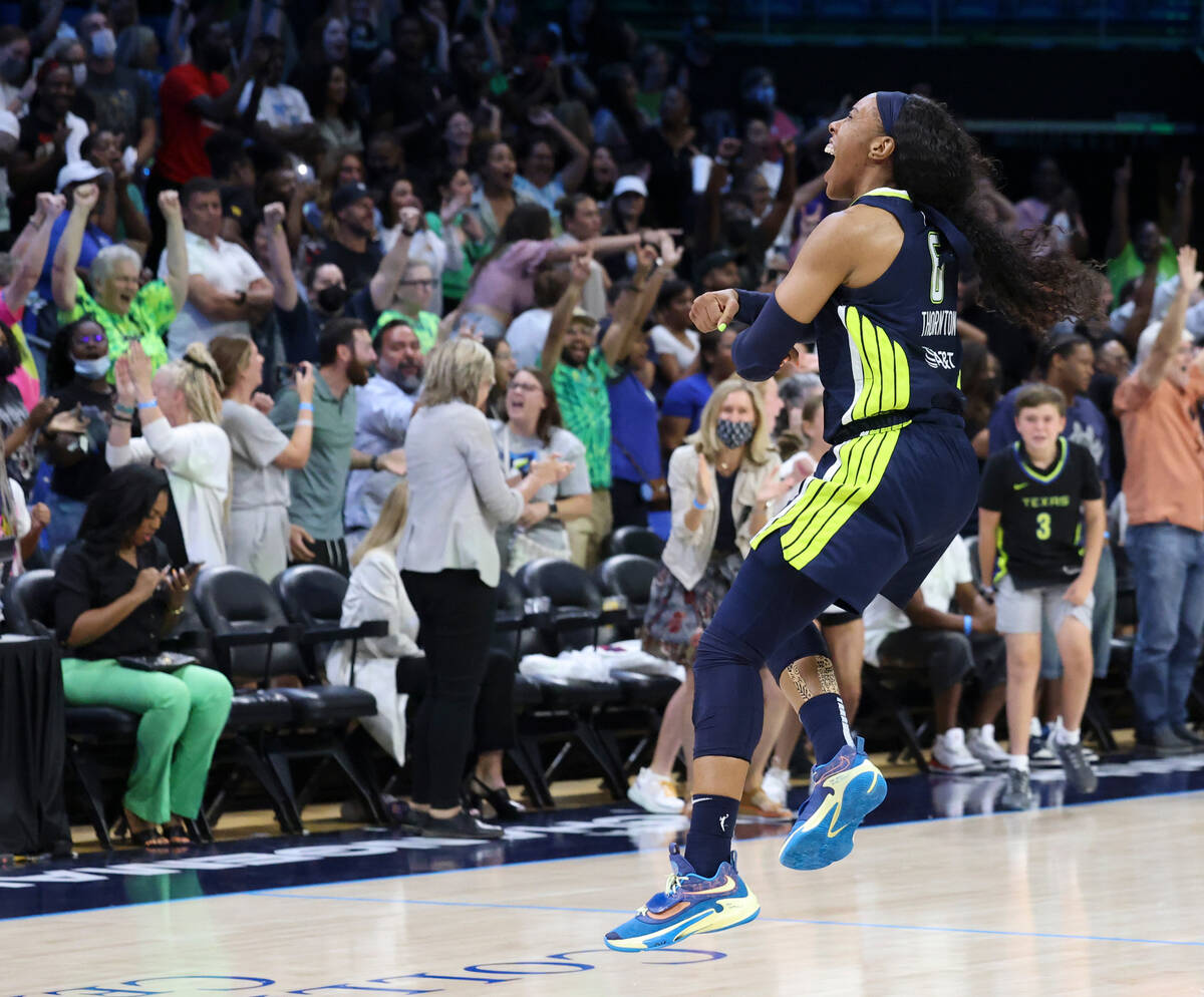 Dallas Wings forward Kayla Thornton (6) celebrates the team's win against the Las Vegas Aces in ...