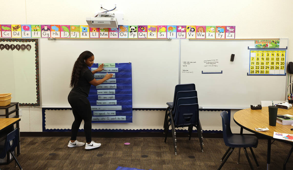 Kindergarten teacher Nyjaa Peterson sets up her classroom at Bell Elementary School in Las Vega ...