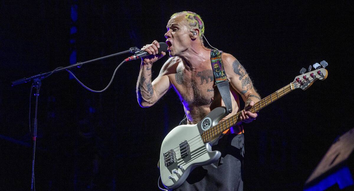 Bassist Flea sings with The Red Hot Chili Peppers at Allegiant Stadium on Saturday, Aug. 6, 202 ...