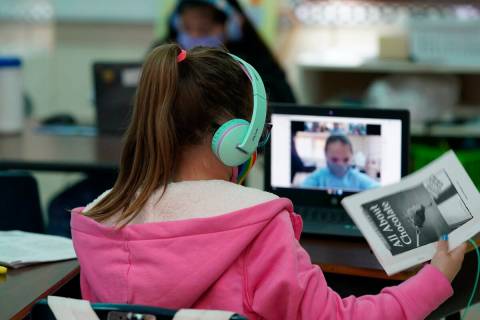 Students at Driggers Elementary School interact with classmates virtually in February 2021 in S ...