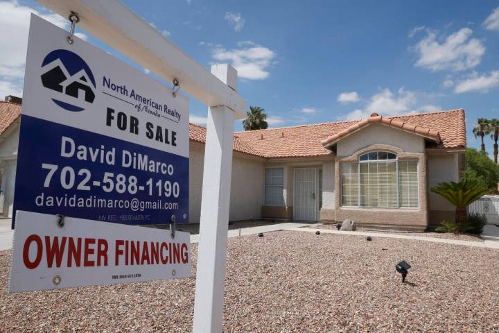 A sales sign is seen at 5251 Misty Morning Drive, Friday, Aug. 5, 2022, in Las Vegas. (Chitose ...