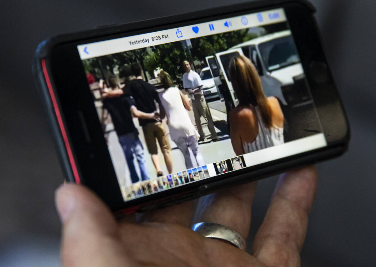 Michael DiVicino, former inmate and author, shows a video of his release that was recorded from ...