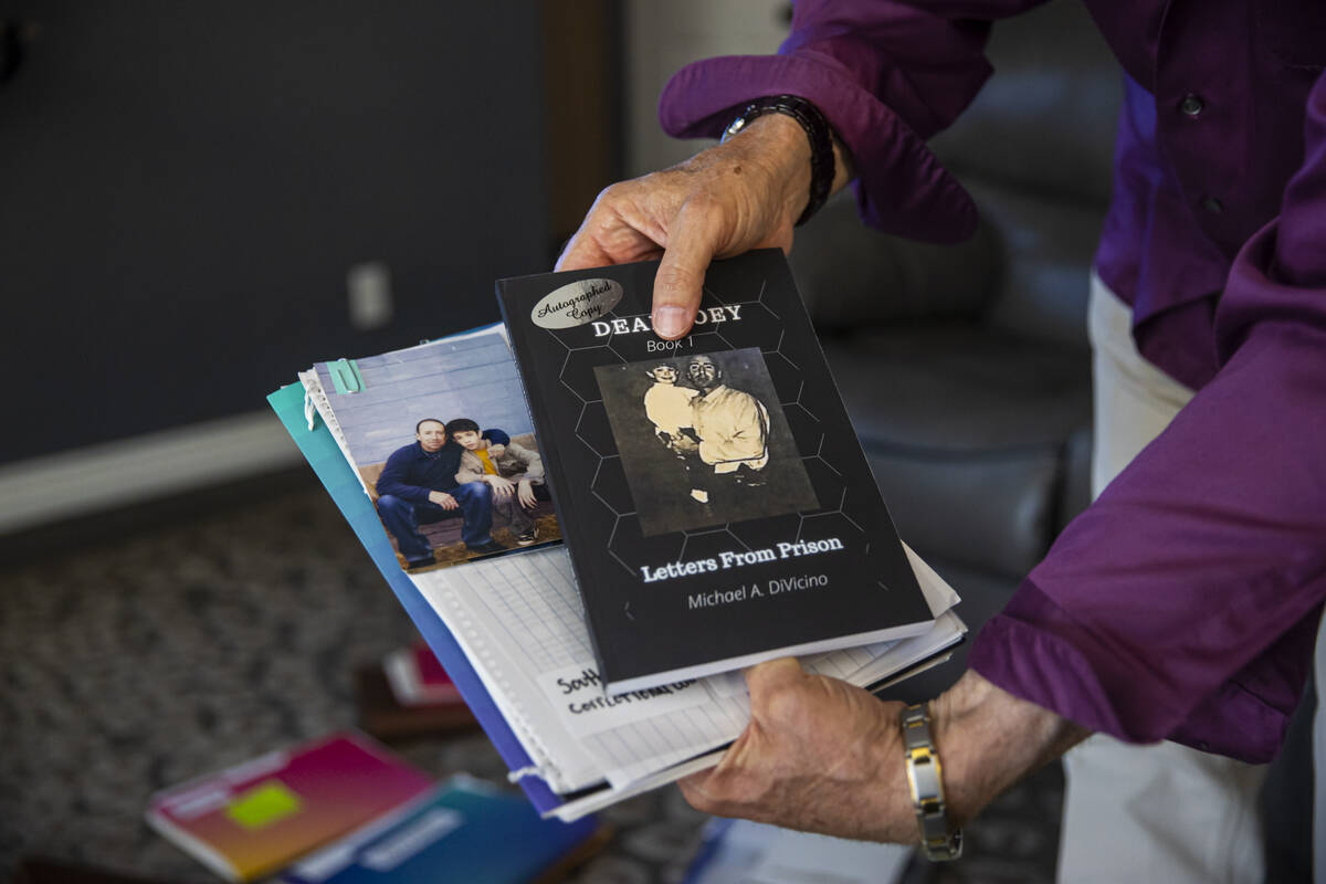 Michael DiVicino, former inmate and author, holds his book “Dear Joey: Letters From Prison” ...