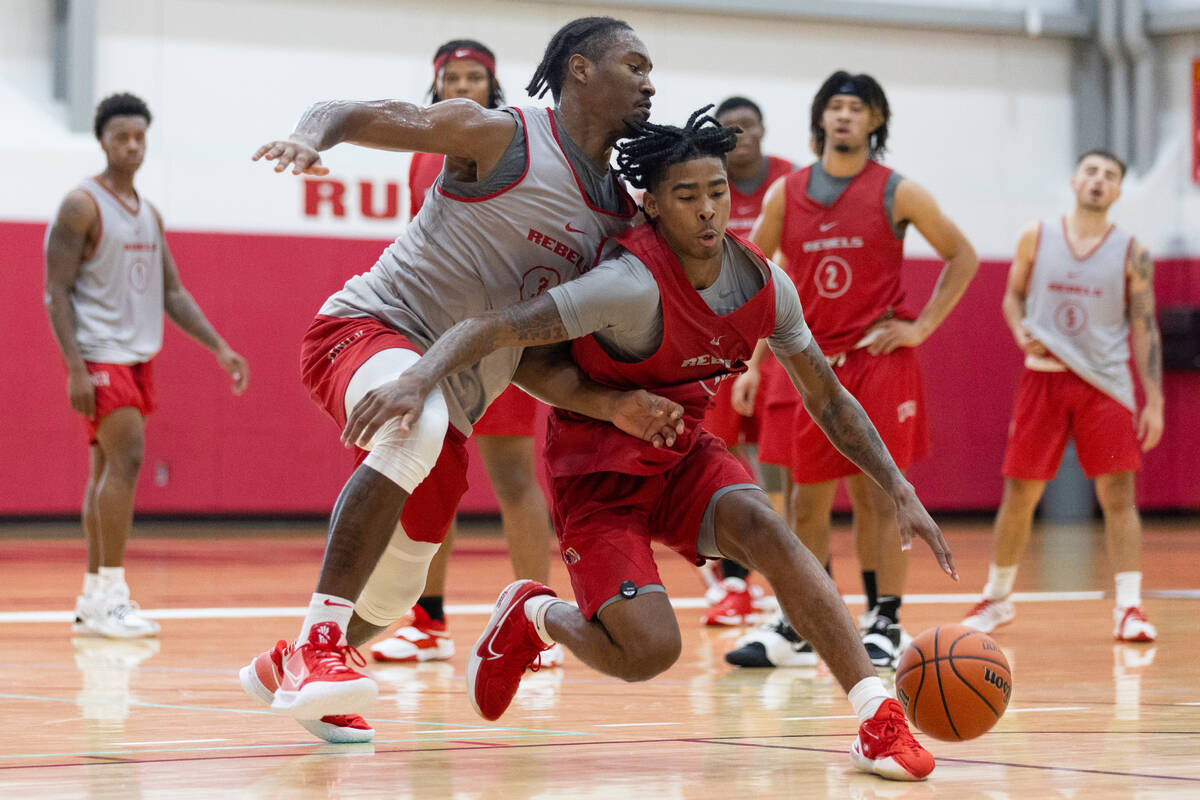 UNLV's Shane Nowell (3) defends against Keshon Gilbert (10) during a team basketball practice a ...