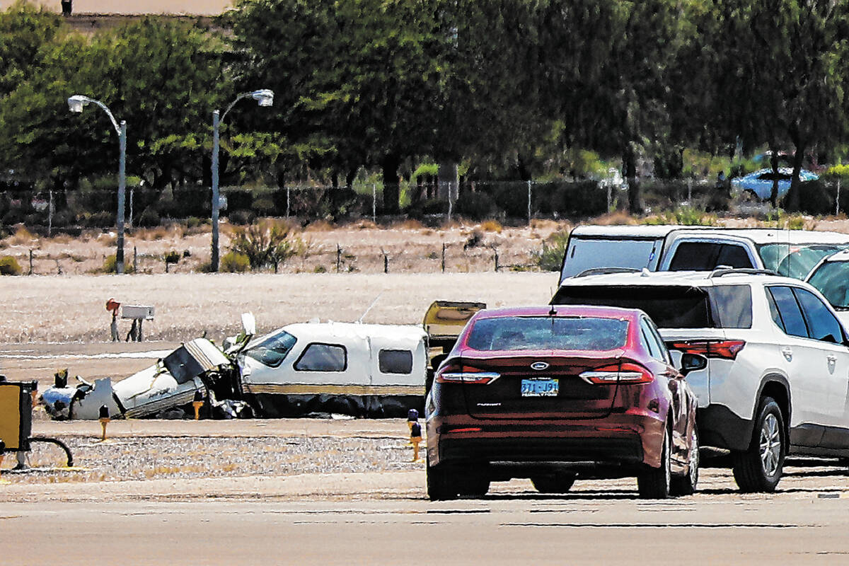 FILE - The scene of a plane crash at North Las Vegas Airport in North Las Vegas, Sunday, July 1 ...