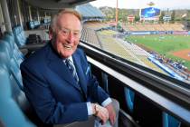 Vin Scully poses for a photo prior a baseball game between the Los Angeles Dodgers and the San ...
