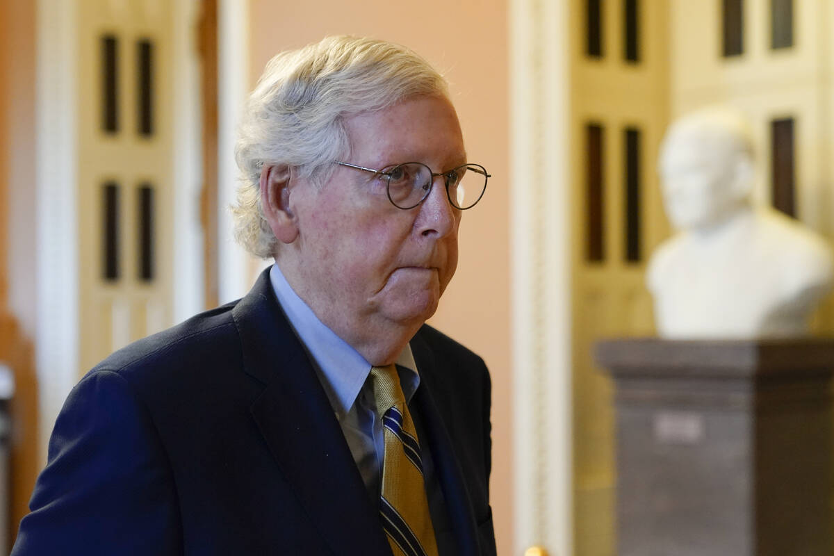 Senate Minority Leader Mitch McConnell of Ky., walks to his office on Capitol Hill in Washingto ...