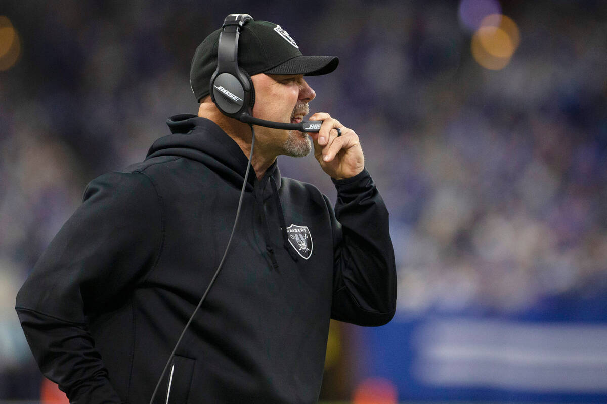 Raiders defensive coordinator Gus Bradley coaches from the sideline during the first half of an ...