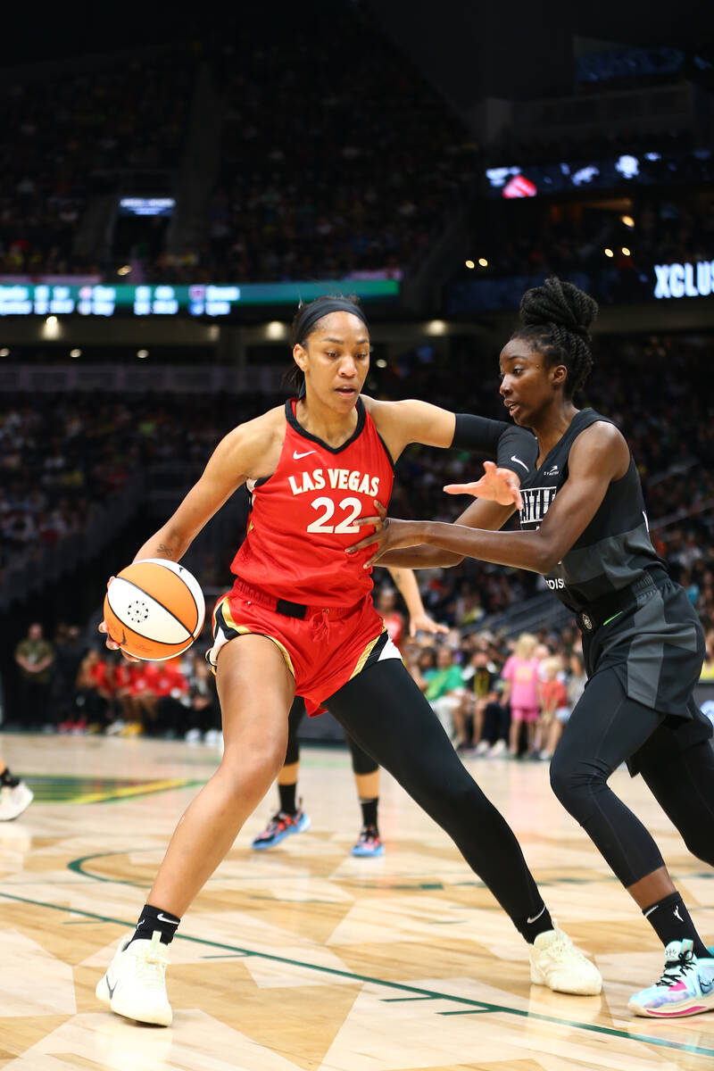 A'ja Wilson #22 of the Las Vegas Aces drives to the basket during the game against the Seattle ...