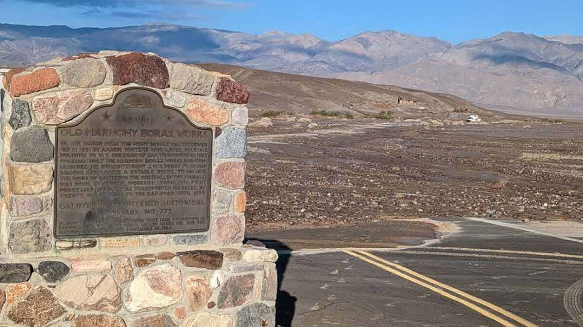 Road at Harmony Borax covered in debris from flooding at Death Valley National Park. (NPS photo)