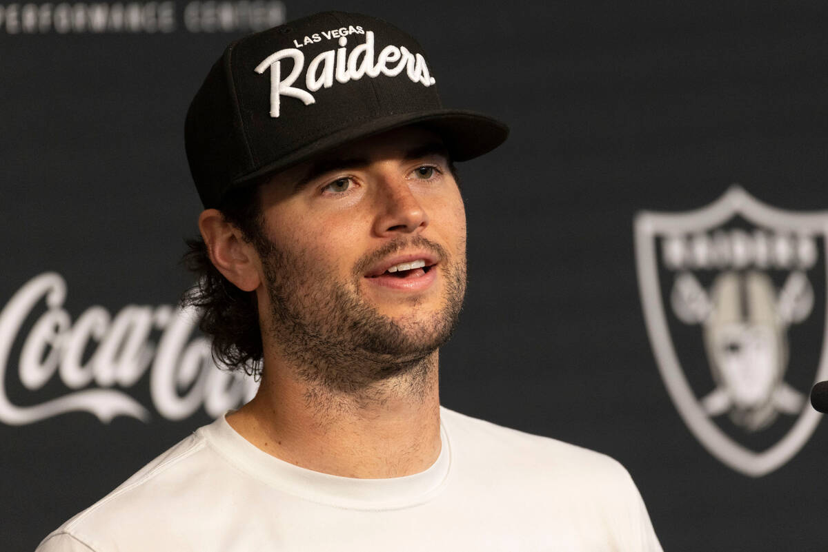 Raiders quarterback Jarrett Stidham answers questions during a news conference following the te ...