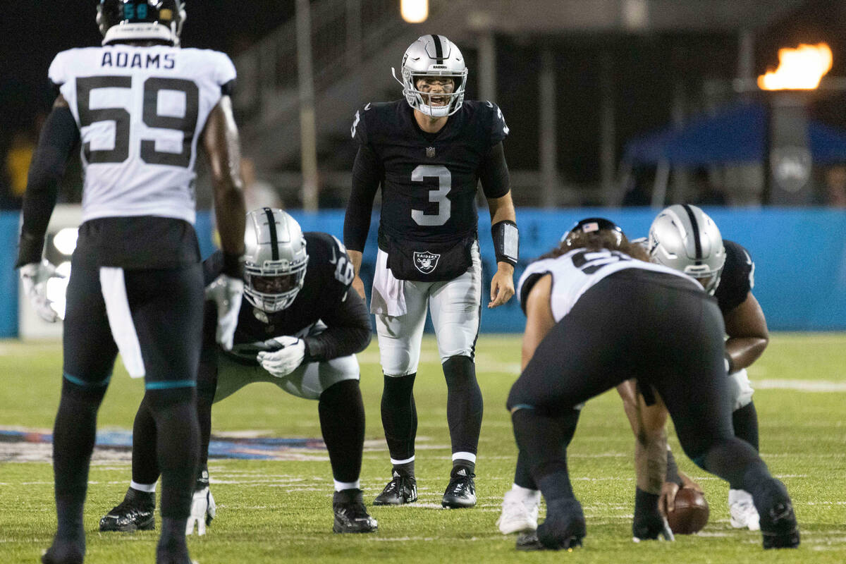 Raiders quarterback Jarrett Stidham (3) calls for the snap during the first half of the NFL Hal ...