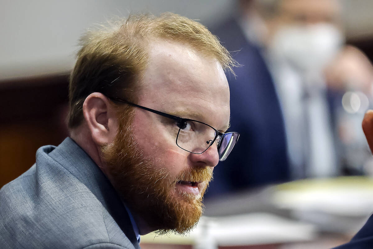 FILE - Travis McMichael looks on during the sentencing in his trial along with his father Greg ...