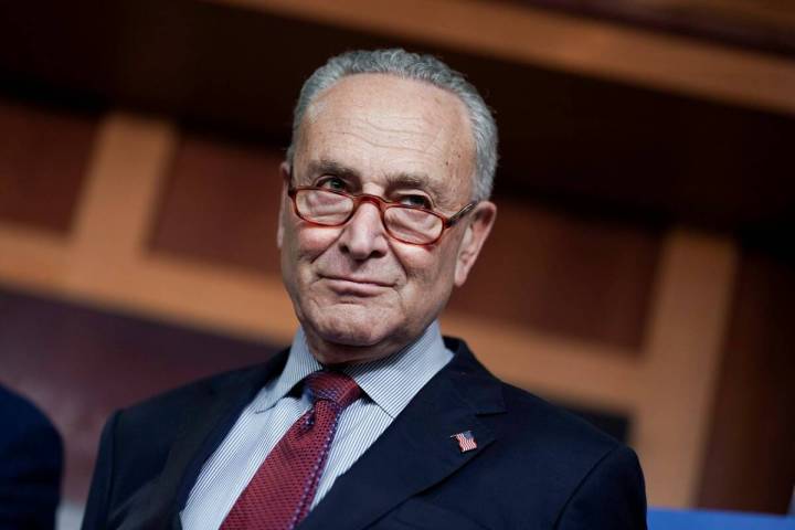 Senate Majority Leader Chuck Schumer, D-N.Y., speaks to reporters at the Capitol in Washington, ...