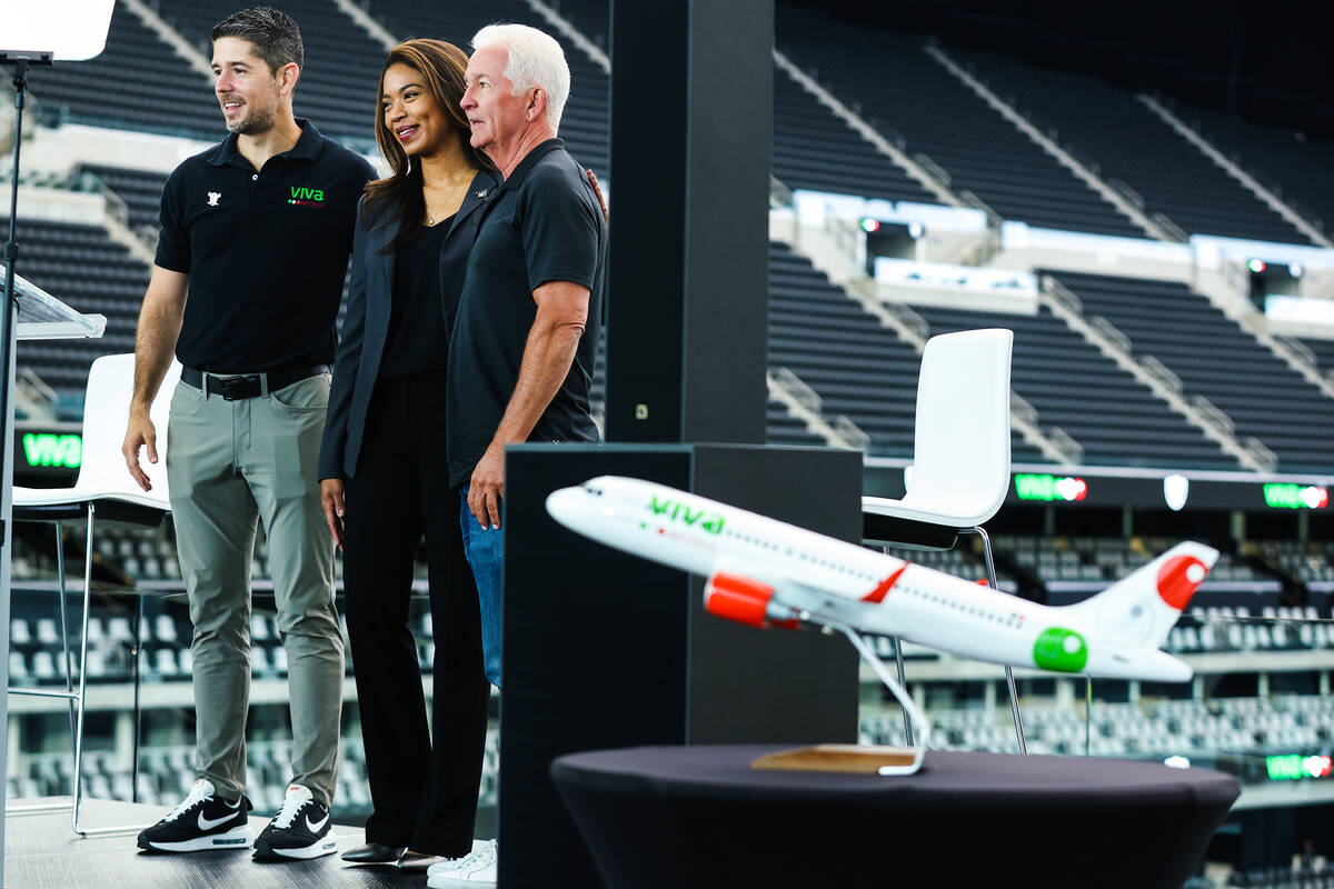 Viva Aerobus Airlines CEO Juan Carlos Zuazua, from left, Raiders President Sandra Morgan, cente ...