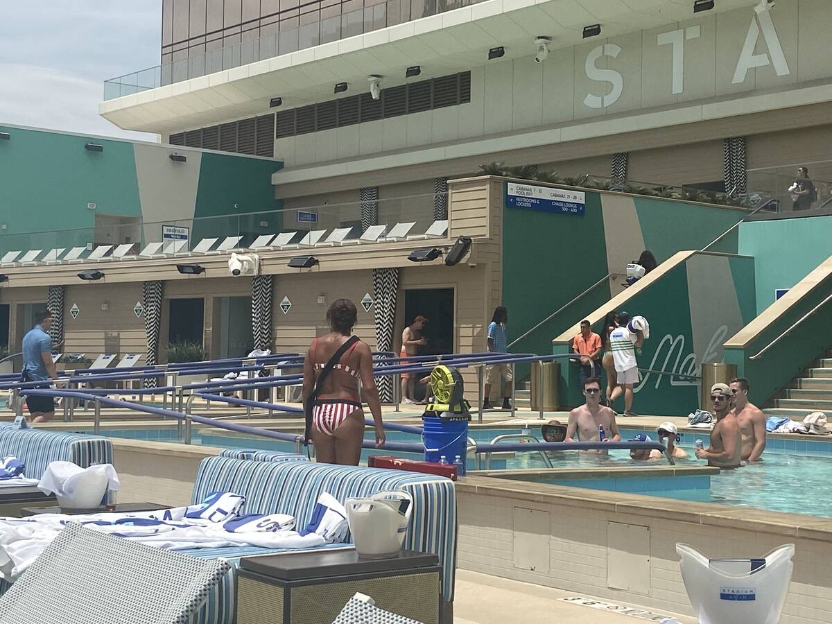 A lifeguard watches over pool-goers at Circa Resort's Stadium Swim on July 22, 2022. Lifeguards ...